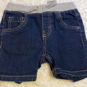 a Toughskins solid blue stretch comfort waist draw string denim shorts 18 mos